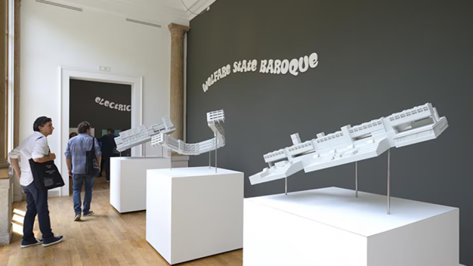 Architectural models displayed in the outer galleries.