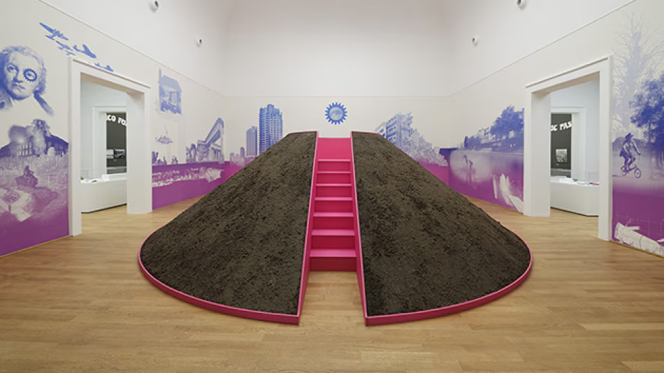 Earth mound and panoramic mural in the central gallery of the British Pavilion.