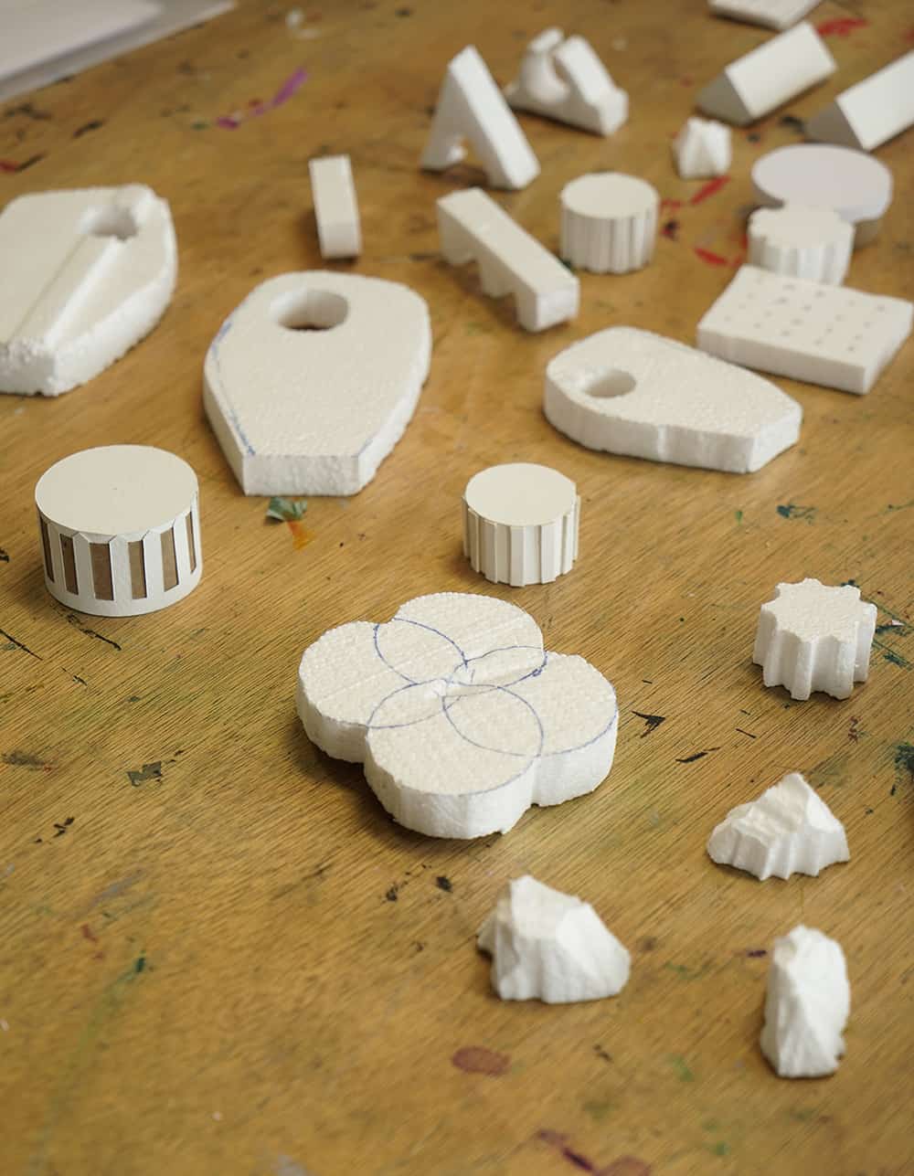 Small white models developed from shapes found in Battersea Park