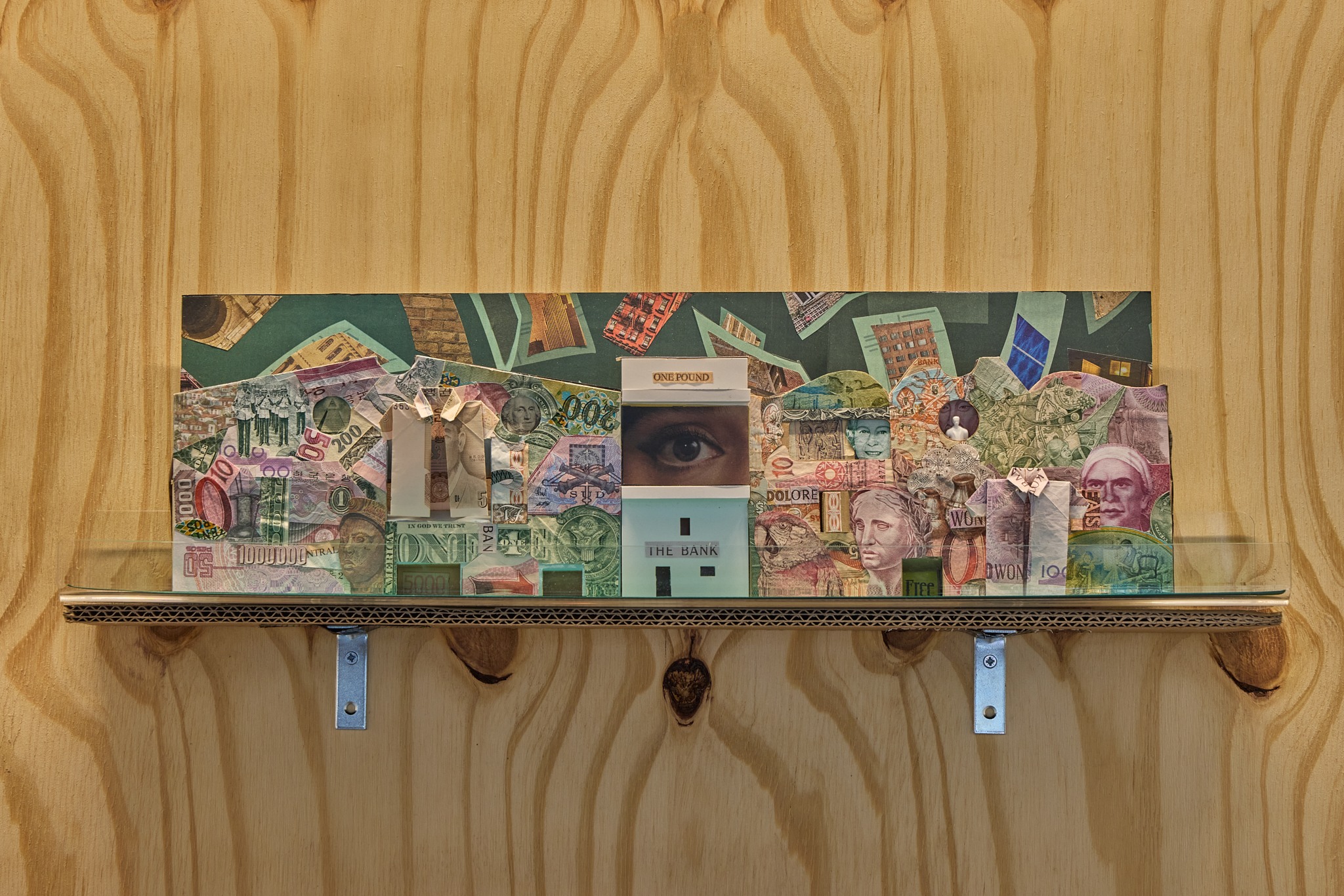 Banknote collage by Madelon Vriesendorp, displayed on a shelf in The Bank of England in Ruins