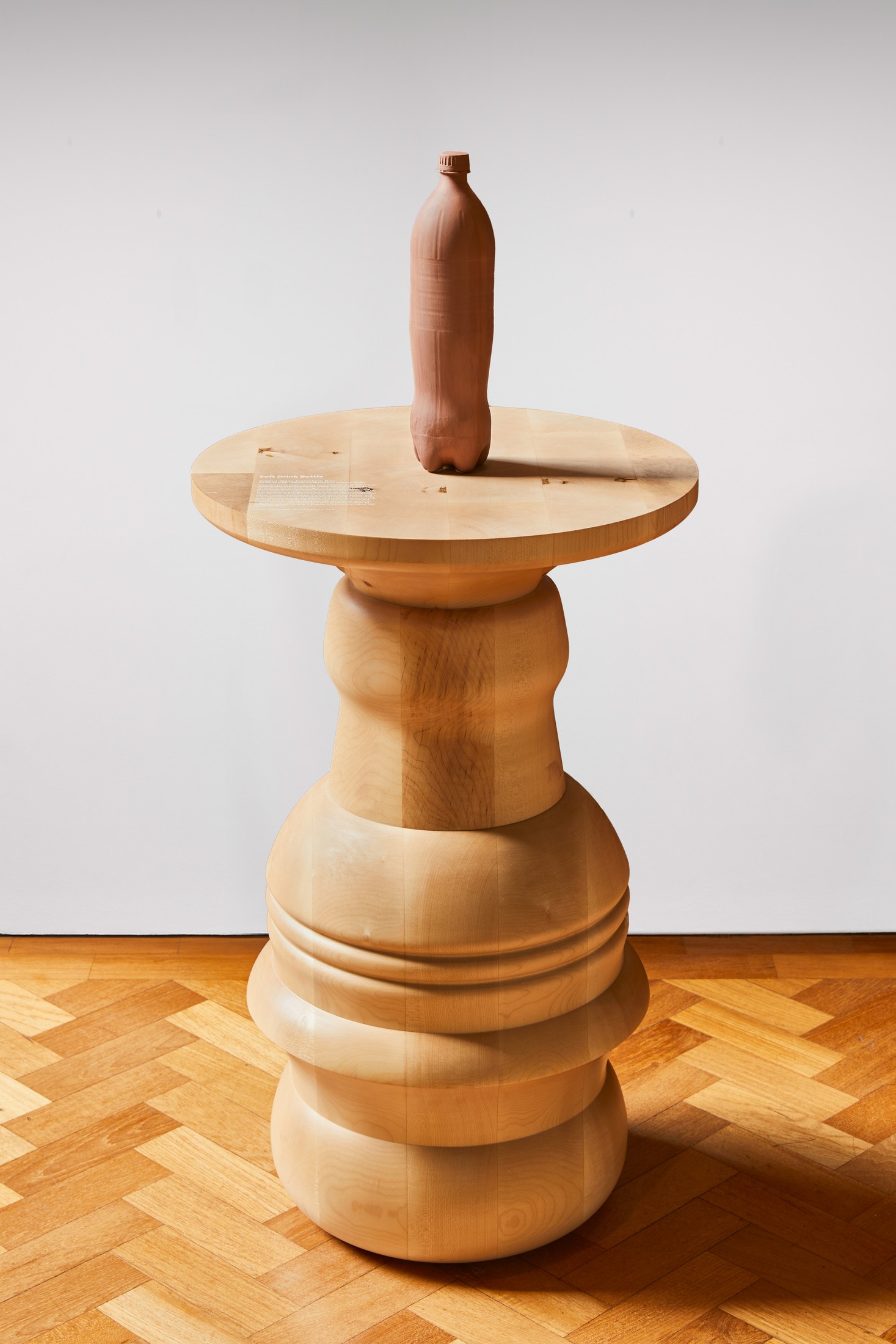 Turned table with slender vessel